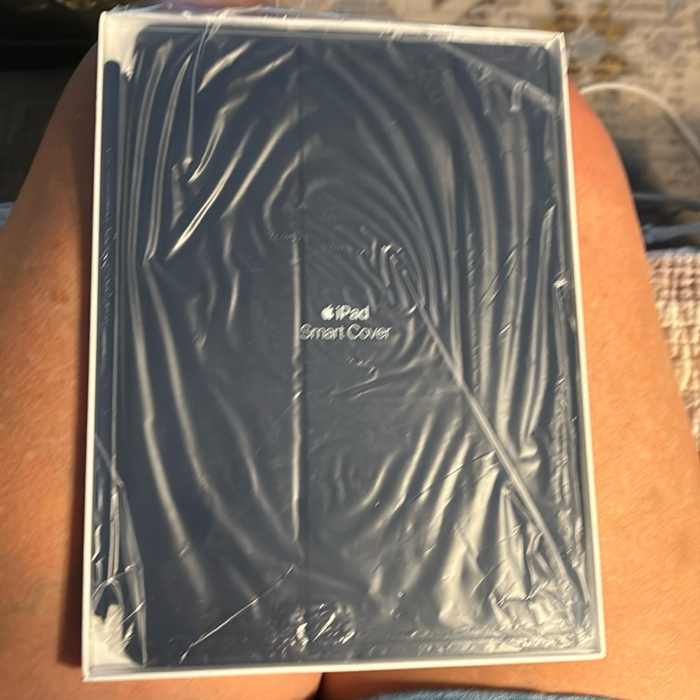 Brand new IPad 9.7” Smart Cover. Still new in package.  Dark blue